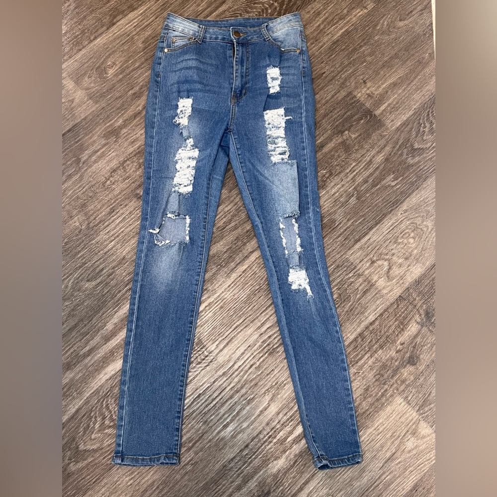Ripped blue jeans
